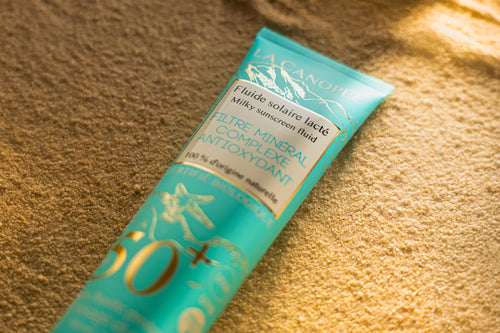 Fluide solaire lacté SPF50+