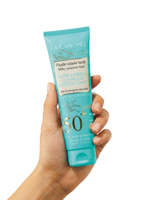 Fluide solaire lacté SPF50+