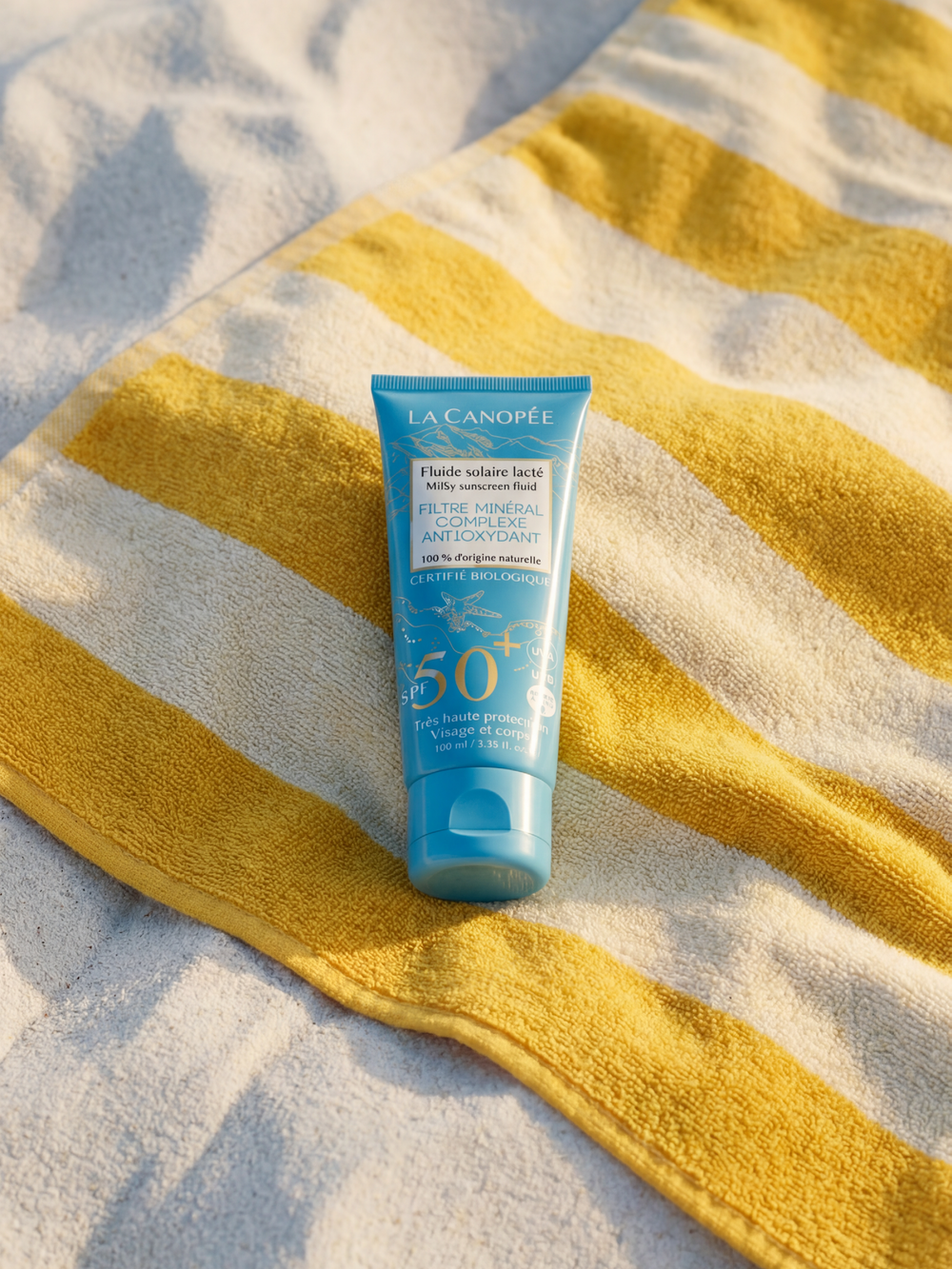 Fluide solaire lacté SPF50+